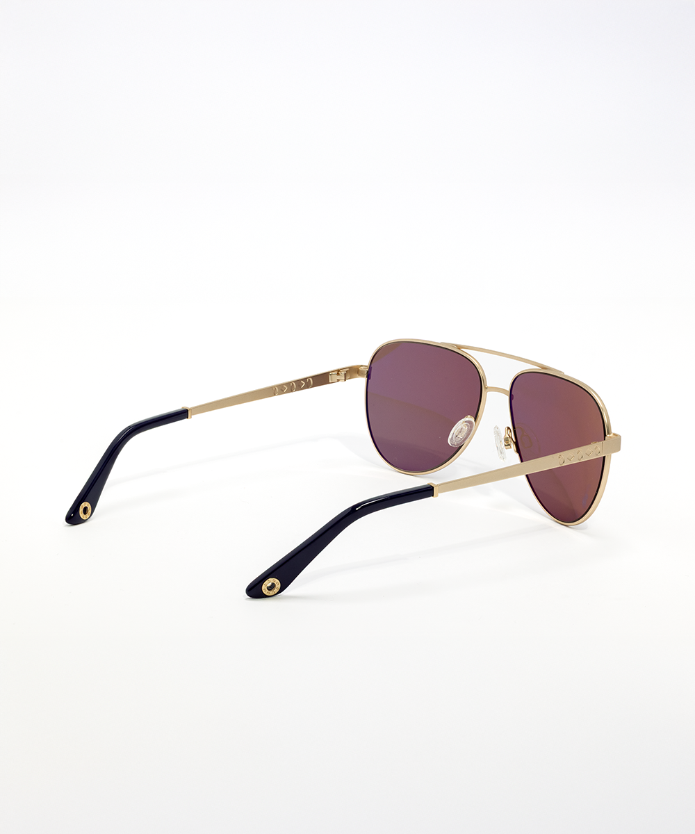 Gold-framed sunglasses with dark lenses