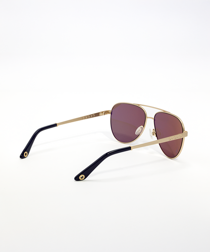 Gold-framed sunglasses with dark lenses